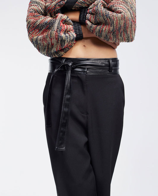 Trousers with waistband detail