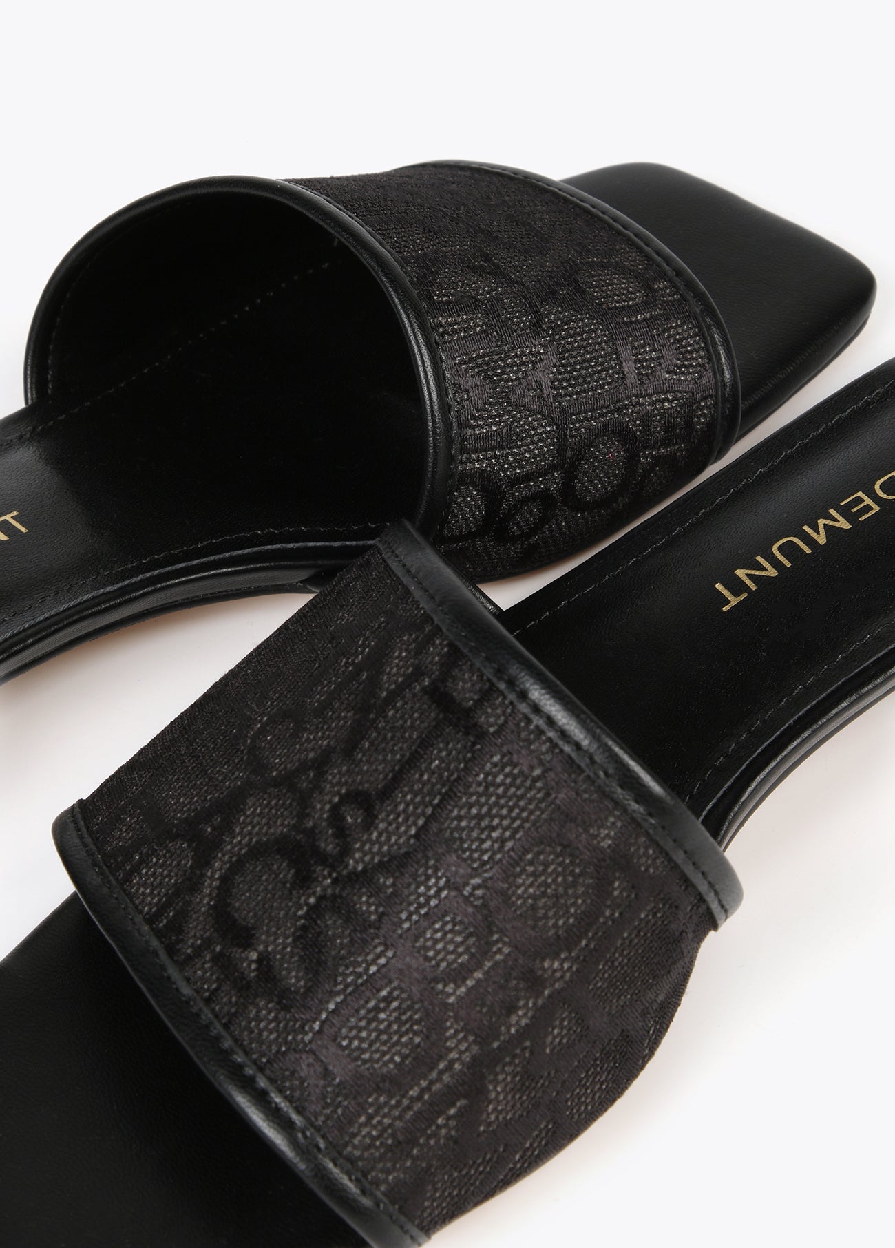 Slider sandals in monogrammed mesh