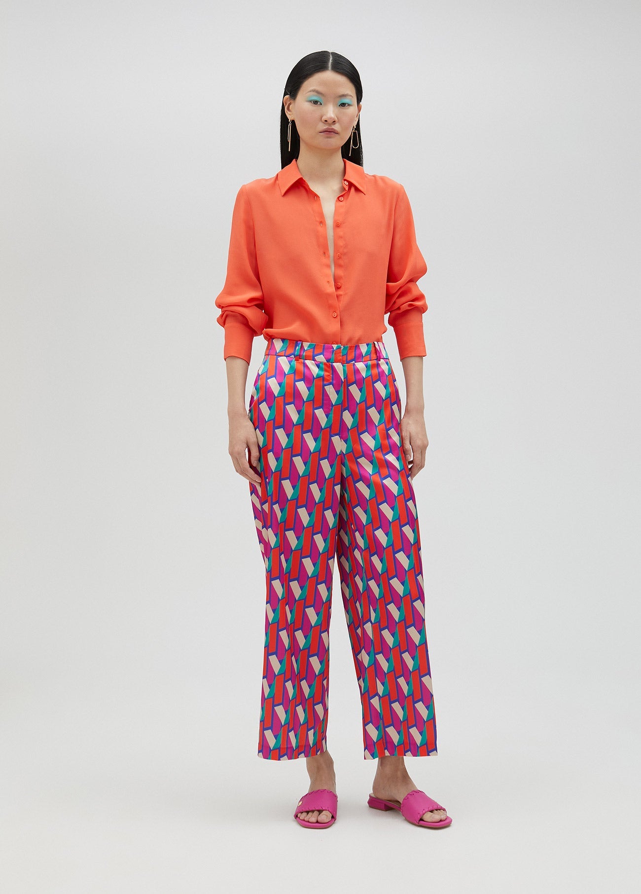 Palazzo trousers in multicoloured logo print
