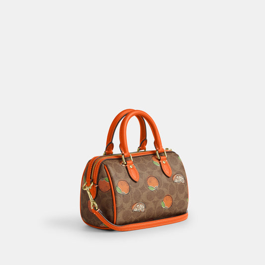 CAL18-Mini Rowan Crossbody Bag In Signature Canvas With Orange Print-Im/Tan Multi