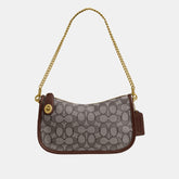CAM48-SWINGER BAG IN SIGNATURE JACQUARD-B4/Oak Maple