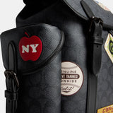 CBF04-Hitch Backpack In Signature Canvas With Patches-Charcoal Multi