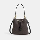 CBH07-Rowan Bucket Bag In Signature Canvas-Im/Walnut/Black