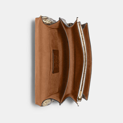 90400-Klare Crossbody In Signature Canvas With Rivets