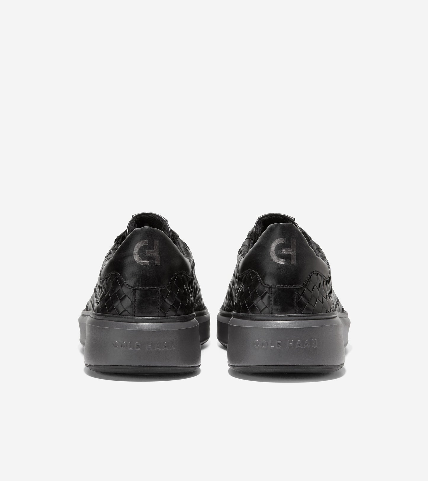 C37128-Men's GrandPrø Topspin Woven Lux Sneaker-Black-Pavement