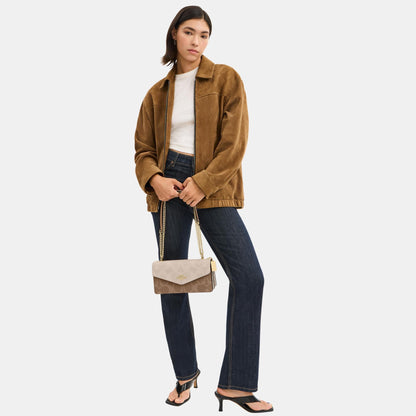 Klare Envelope Crossbody Bag In Blocked Signature Canvas