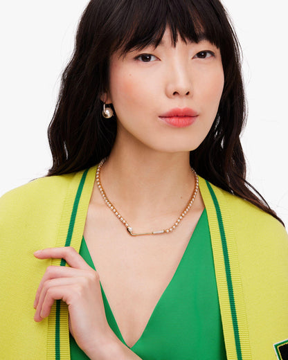 KG358-CLB TENNIS NECK-Cream/Gold