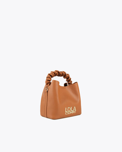 Crossbody bag with gathered strap