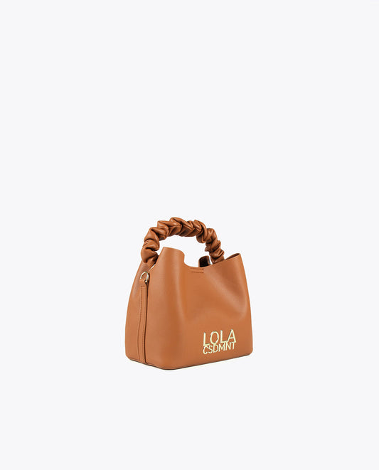 Crossbody bag with gathered strap