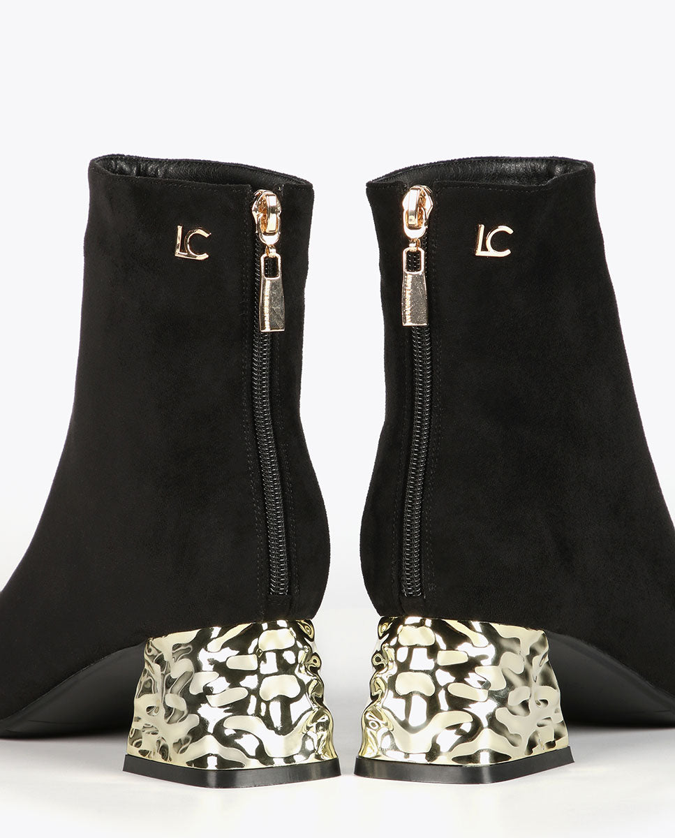 Ankle boots with golden heel