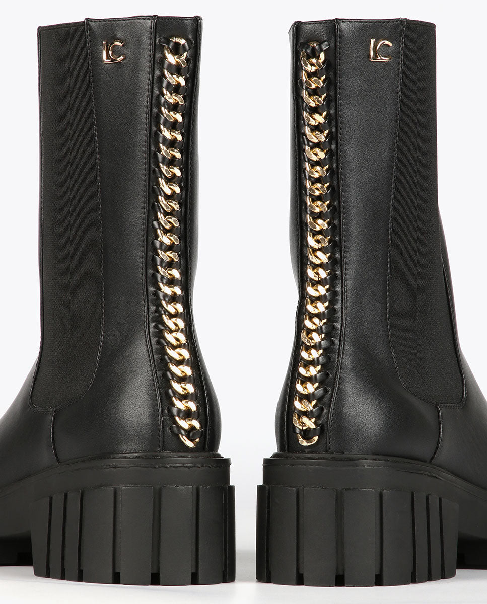 Black ankle boots with chain