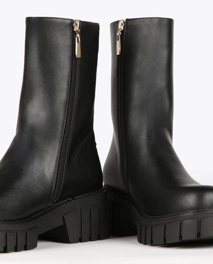 Black ankle boots with chain
