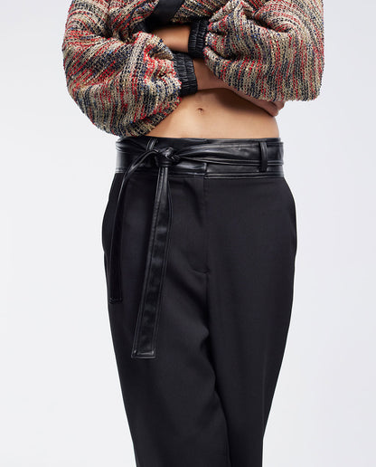 Trousers with waistband detail