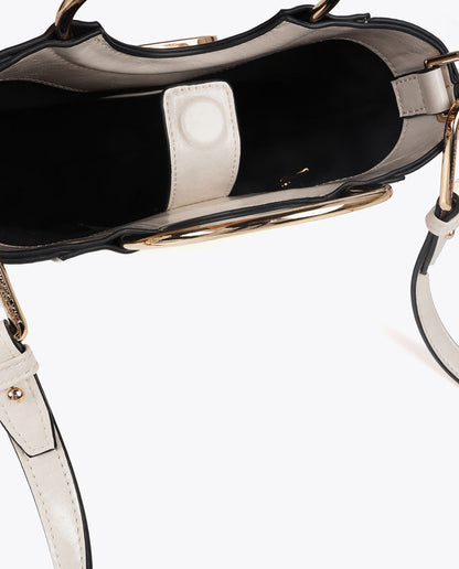 Mini shopper with round metal handle in faux leather and oval LC logo