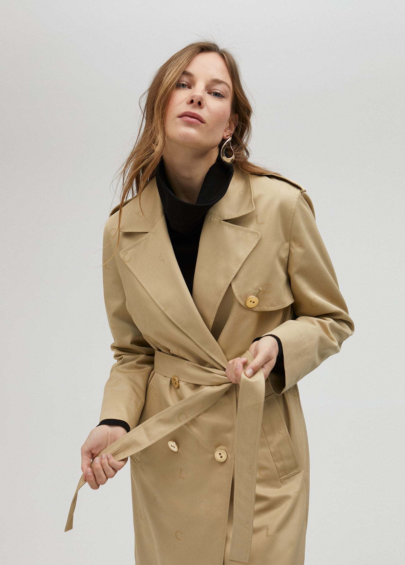 Long monogrammed trench coat
