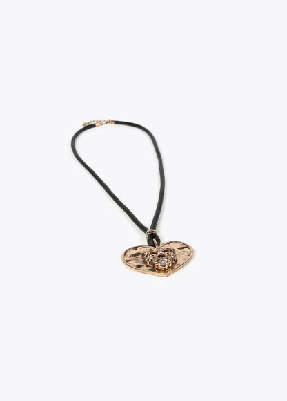 Necklace with gold-toned heart pendant