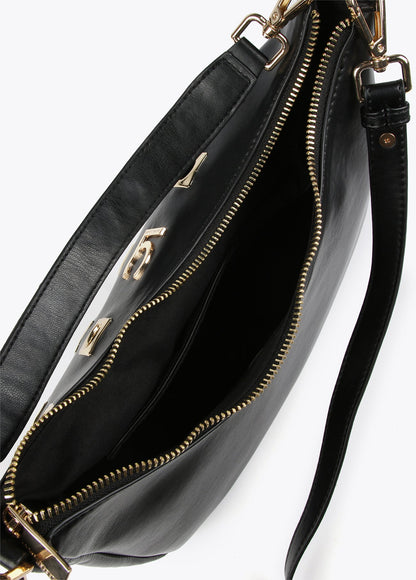 Shoulder bag with square metal eyelets