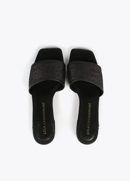 Slider sandals in monogrammed mesh