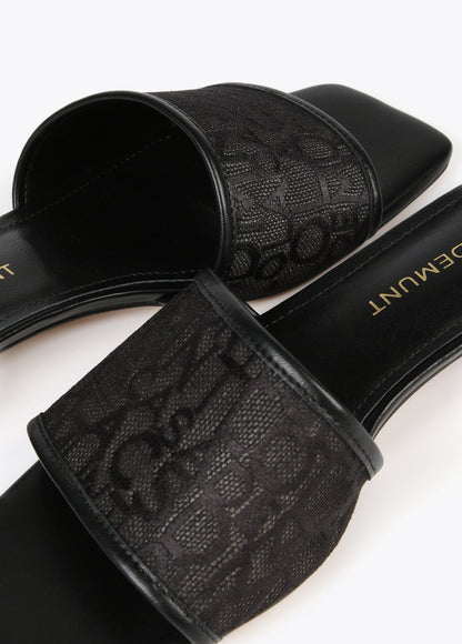 Slider sandals in monogrammed mesh