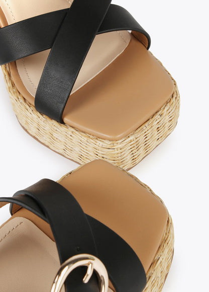 Heeled sandals with buckles