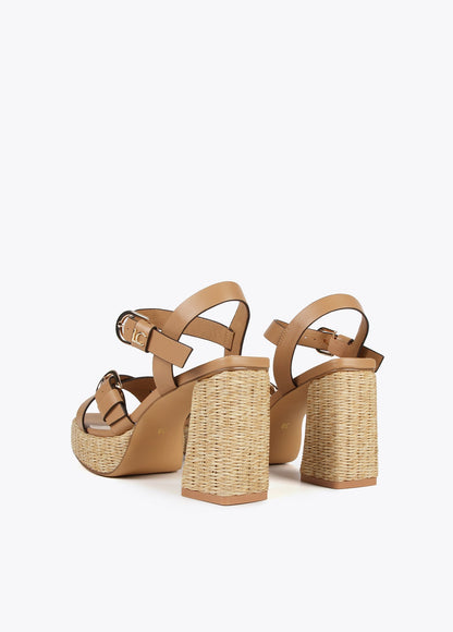 Heeled sandals with buckles