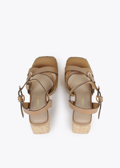 Heeled sandals with buckles