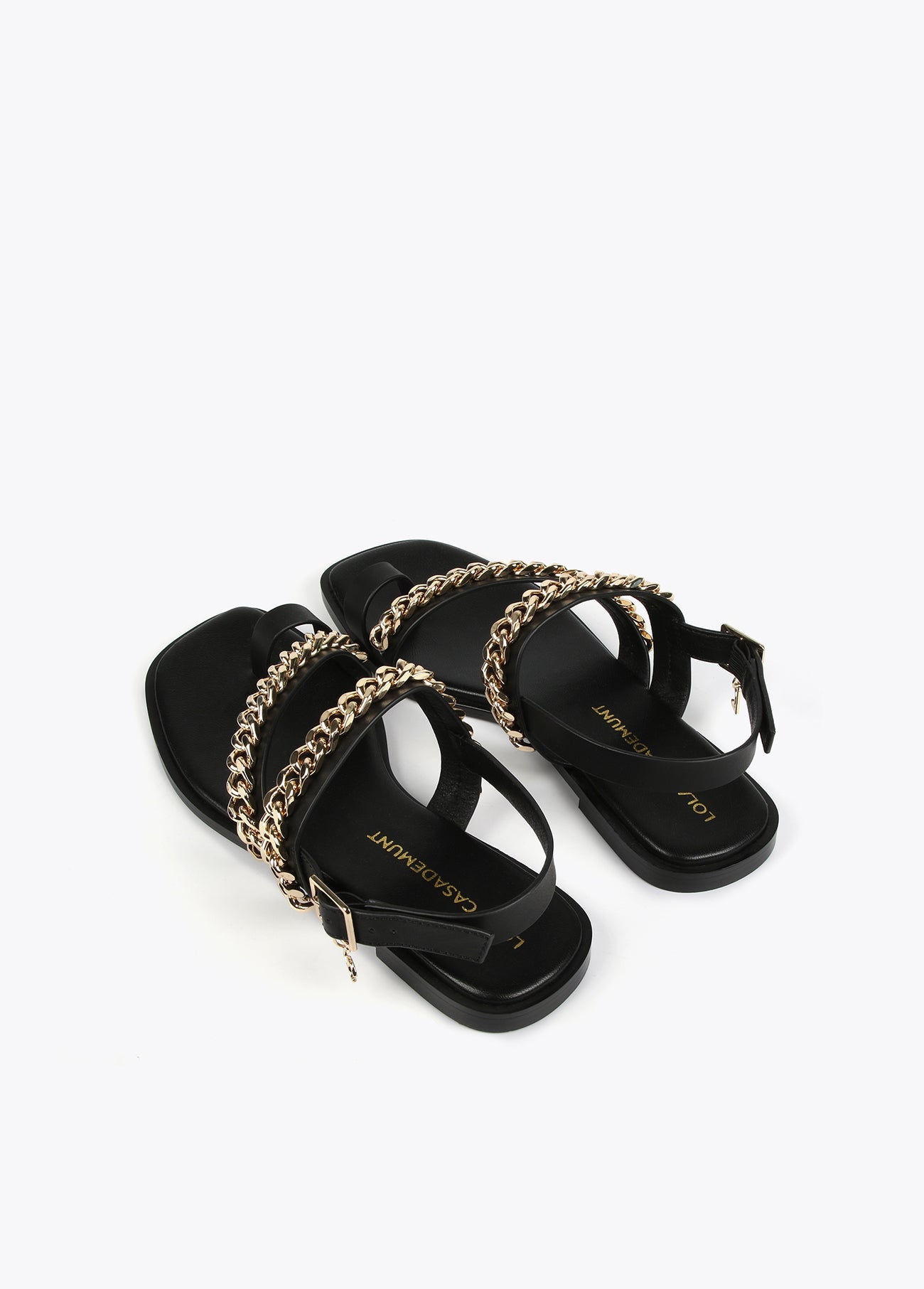 Flat sandals with chain details