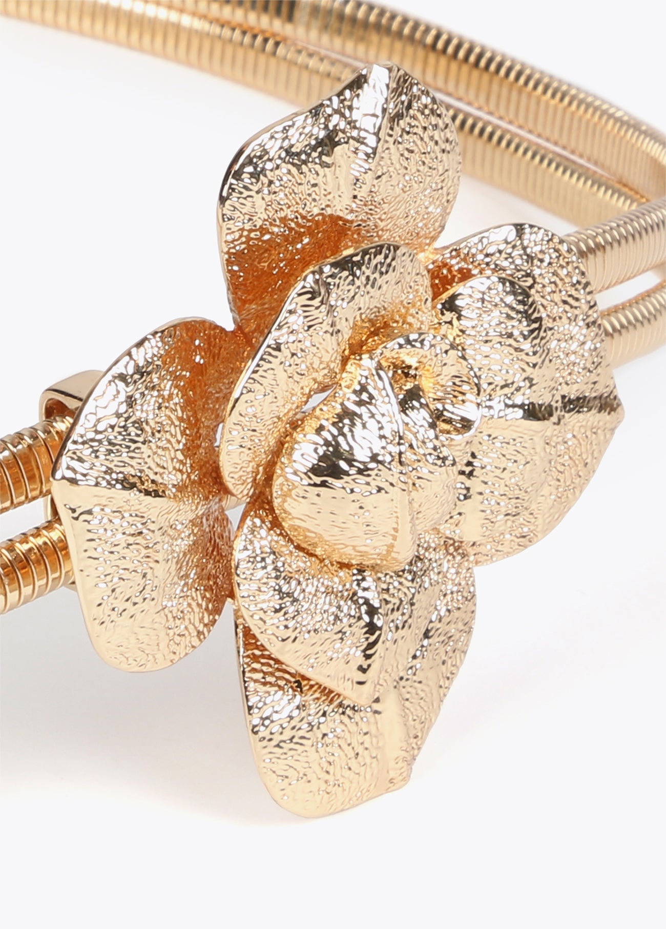 Stretch metal belt with flower