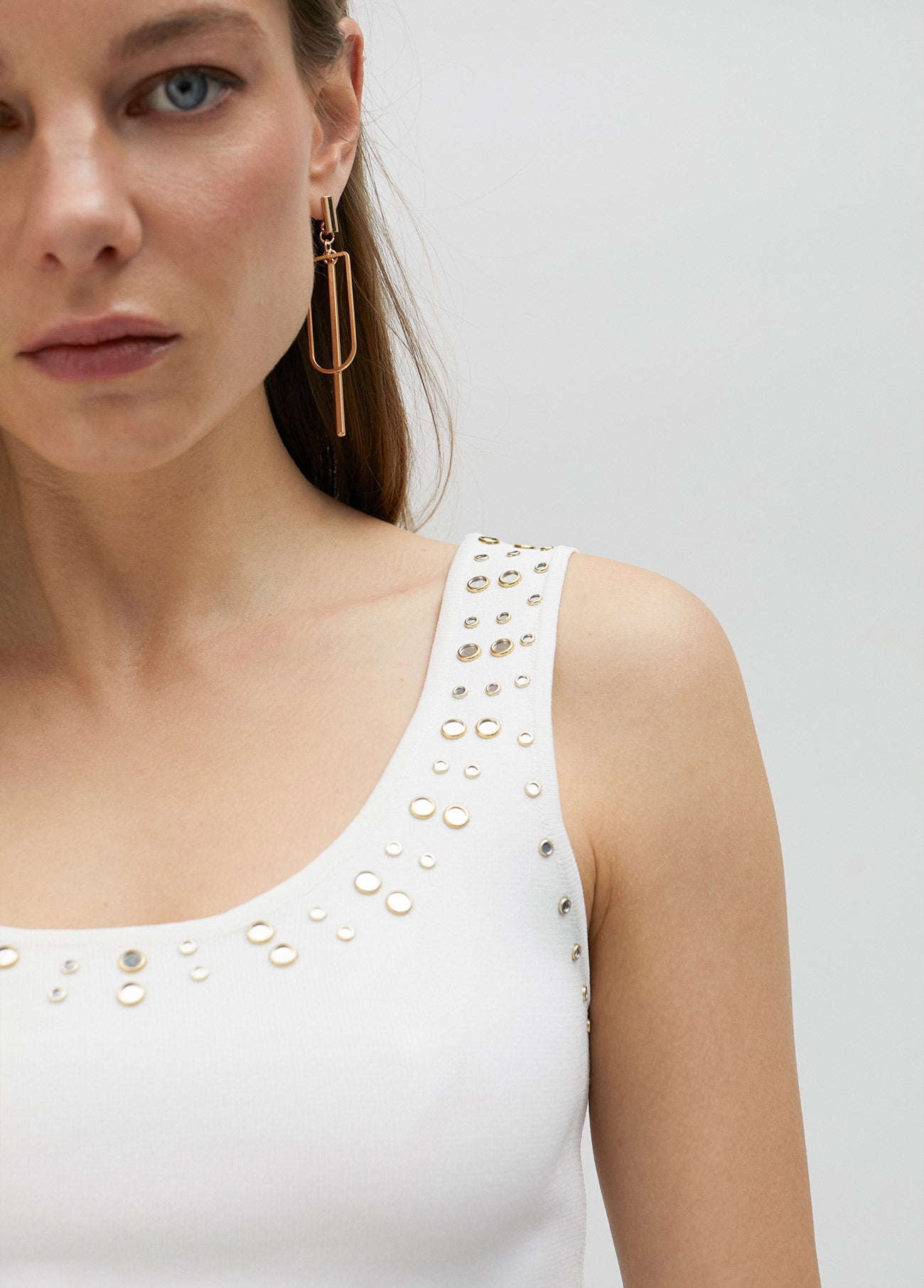 Knit top with rhinestone neckline