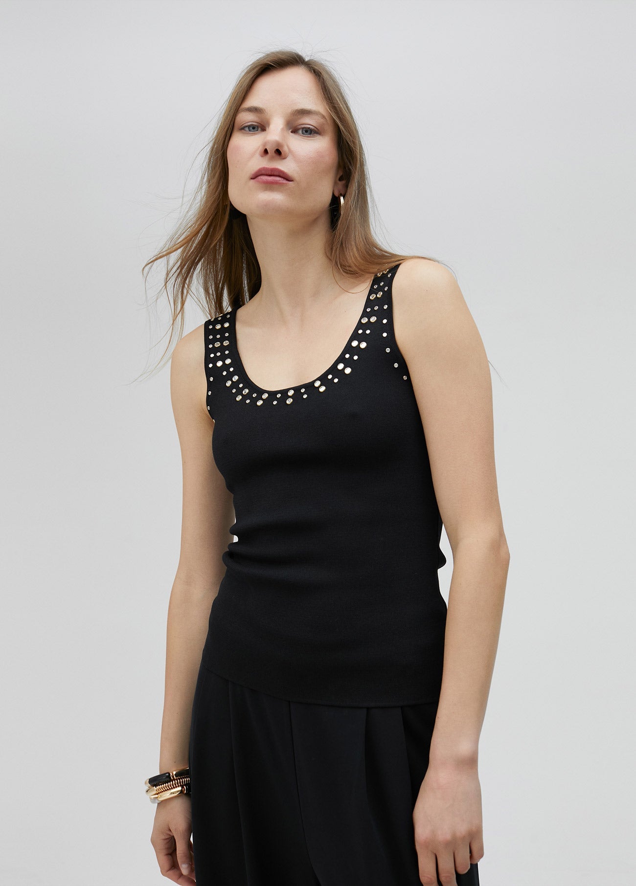 Knit top with rhinestone neckline
