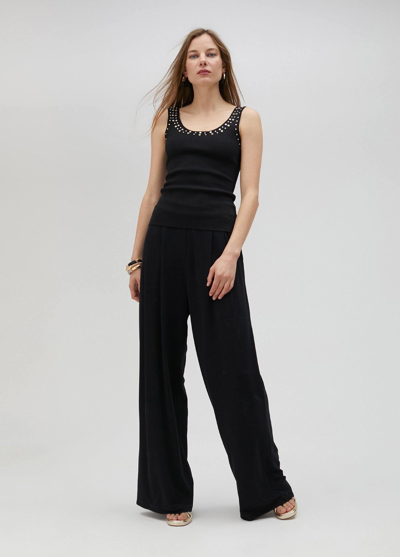 Knit top with rhinestone neckline