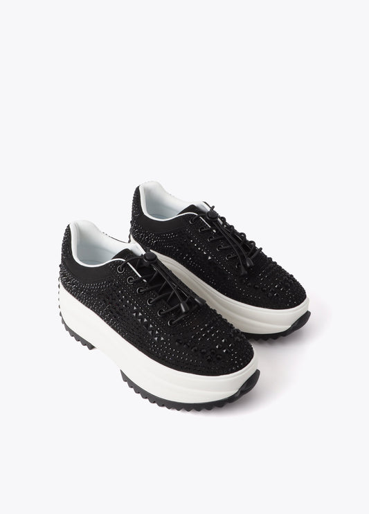 Trainers with transparent sole and rhinestone appliqués