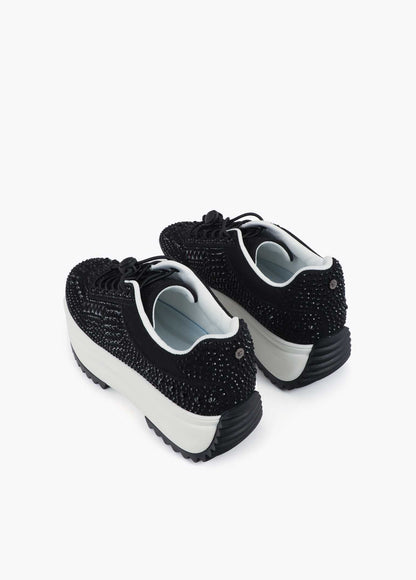 Trainers with transparent sole and rhinestone appliqués