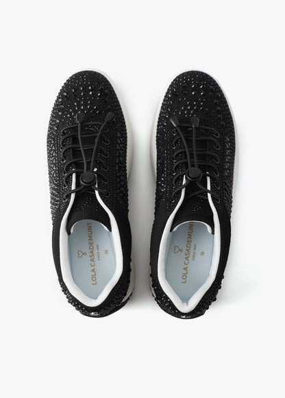 Trainers with transparent sole and rhinestone appliqués