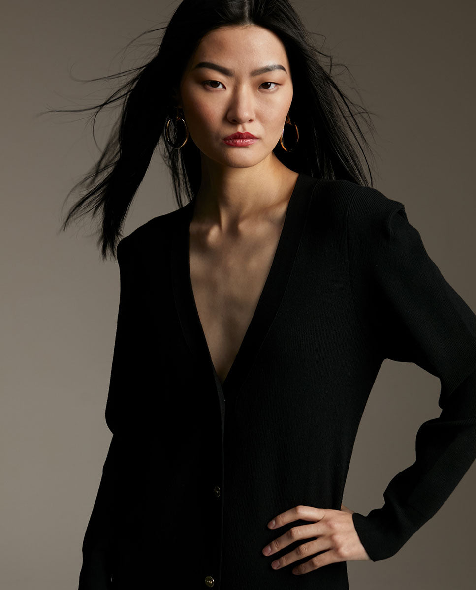 Knit dress with shoulder pads