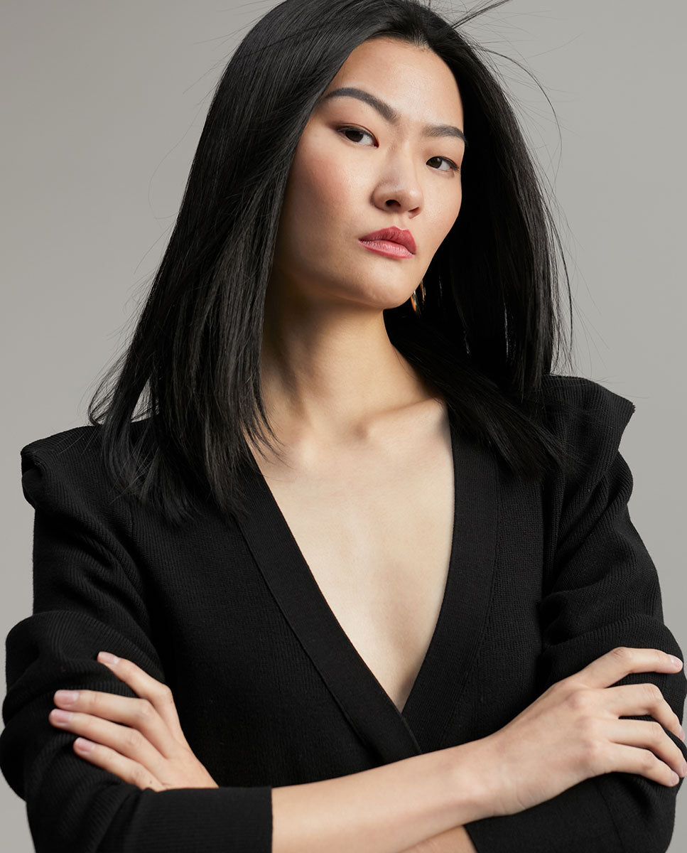 Knit dress with shoulder pads