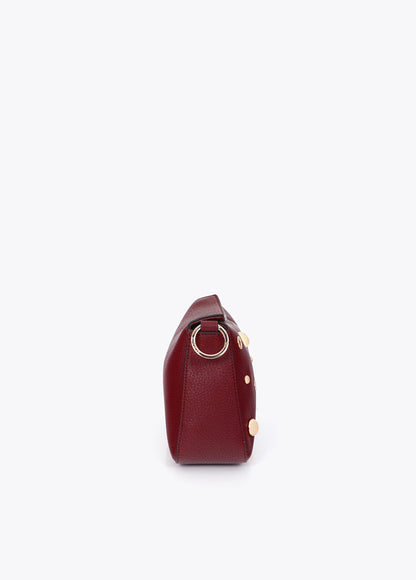 mf2604017-Multi-studded faux leather shoulder bag-Bordeaux