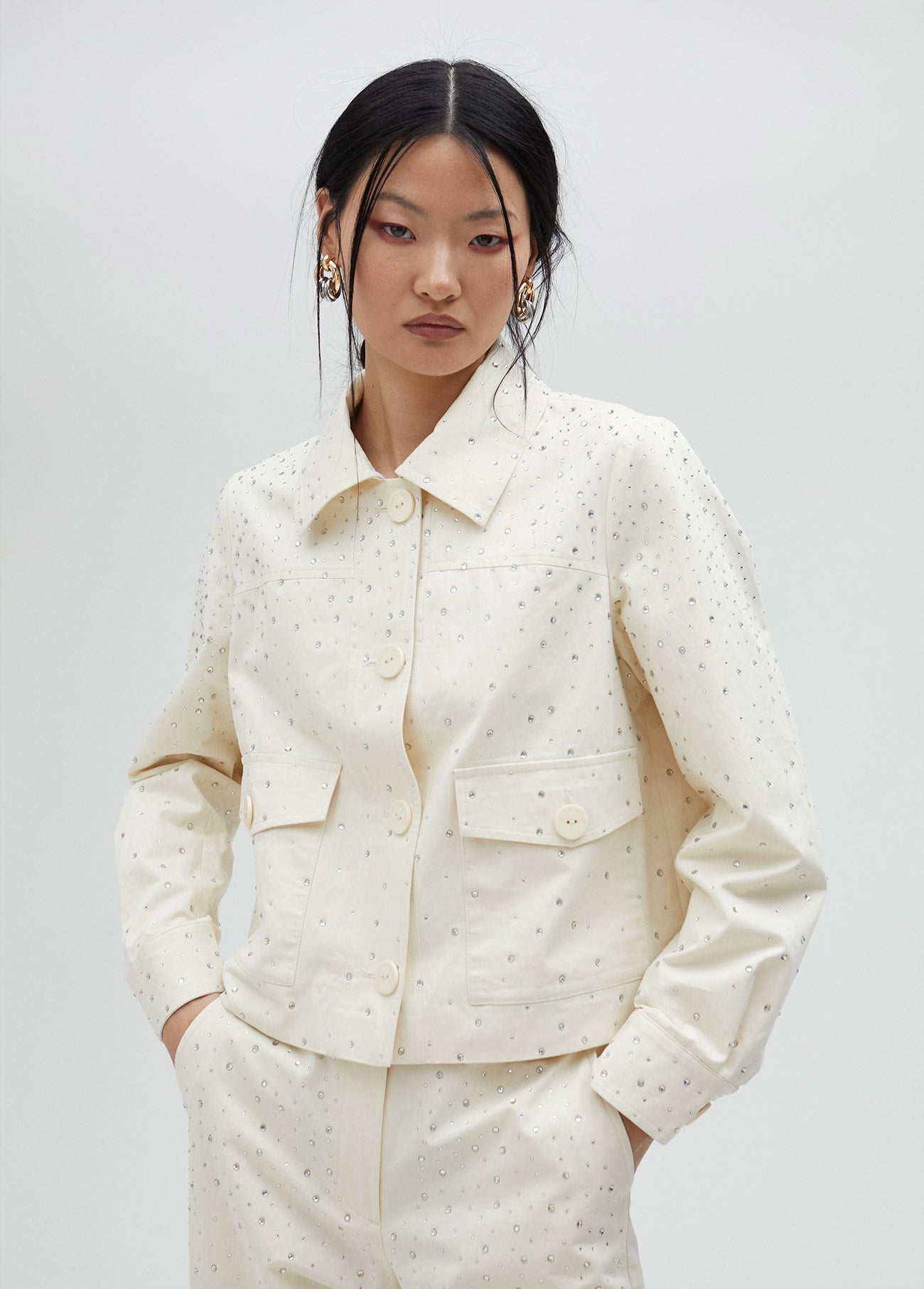 Denim jacket with rhinestone detail