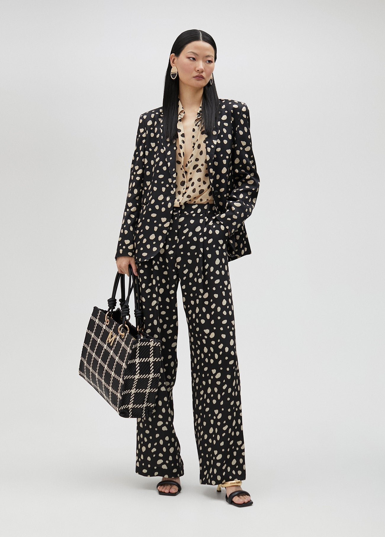 Blazer with irregular polka dots
