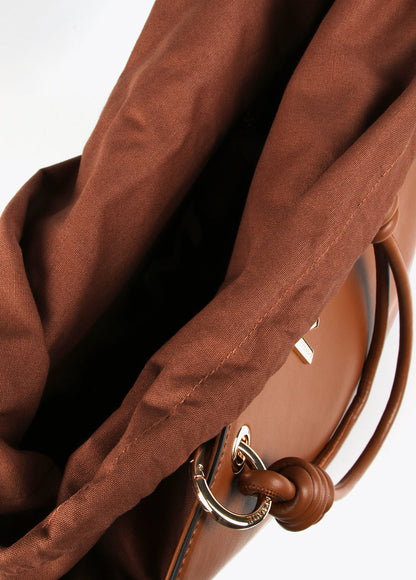 Faux leather bag with knots