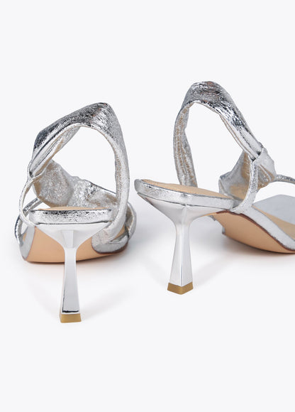 Heeled sandals with metallic straps
