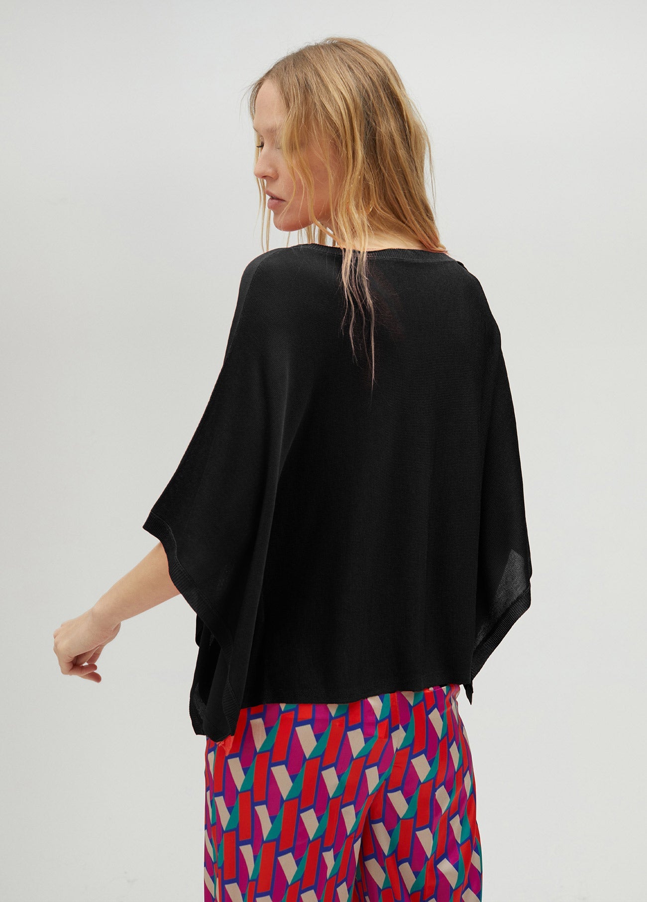 Knit cape sleeve sweater