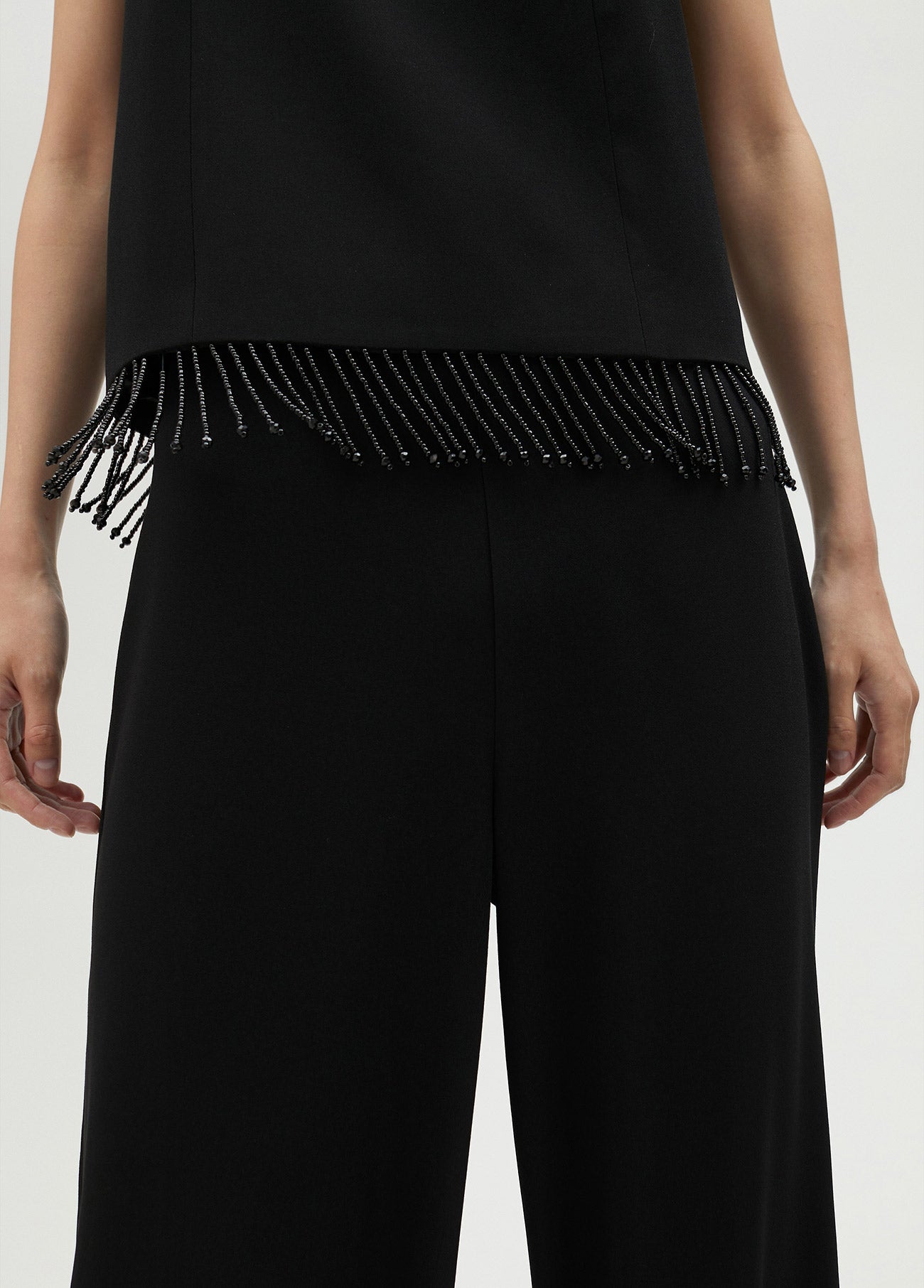 Top with fringing and rhinestones