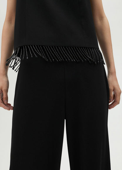 Top with fringing and rhinestones