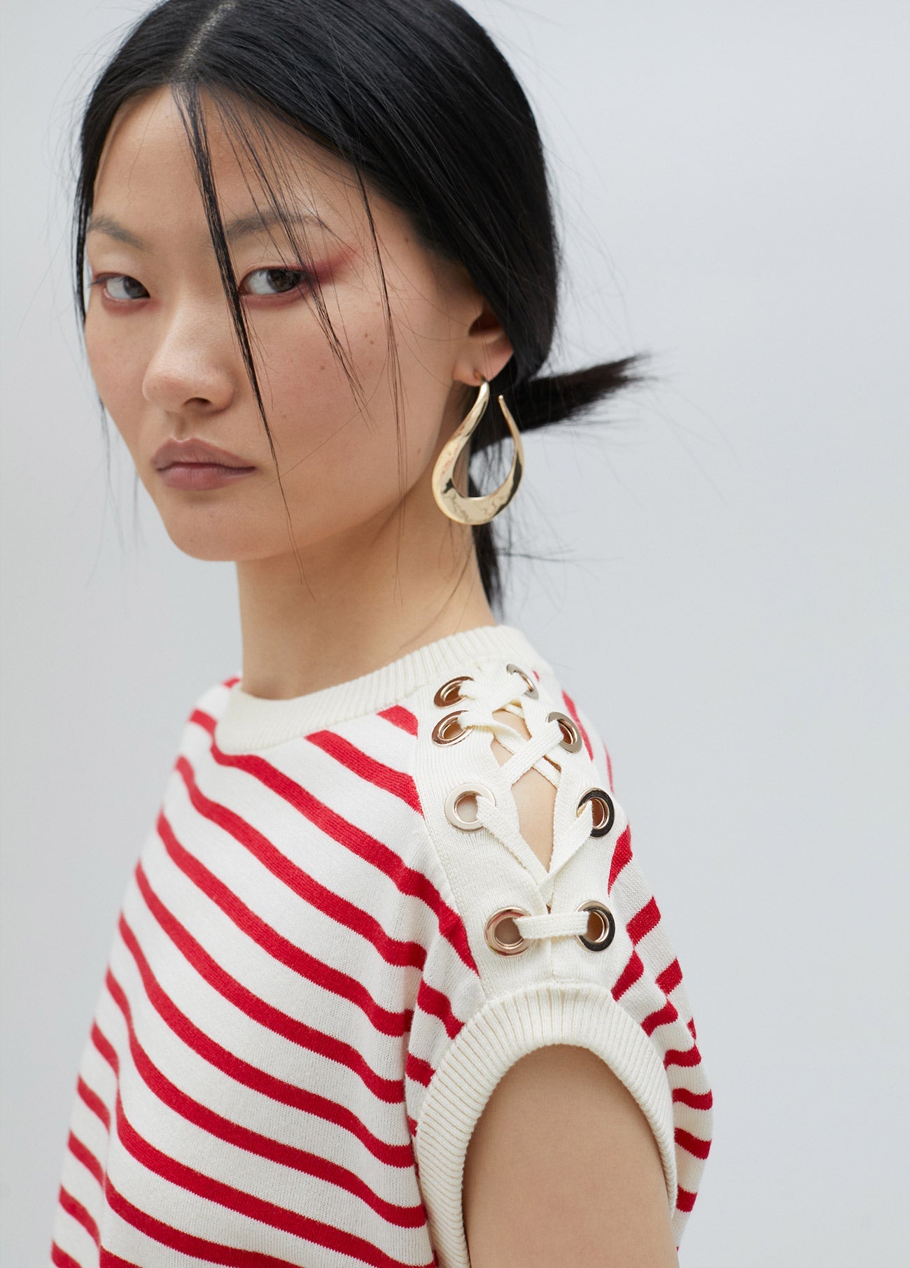 Striped top with eyelet details