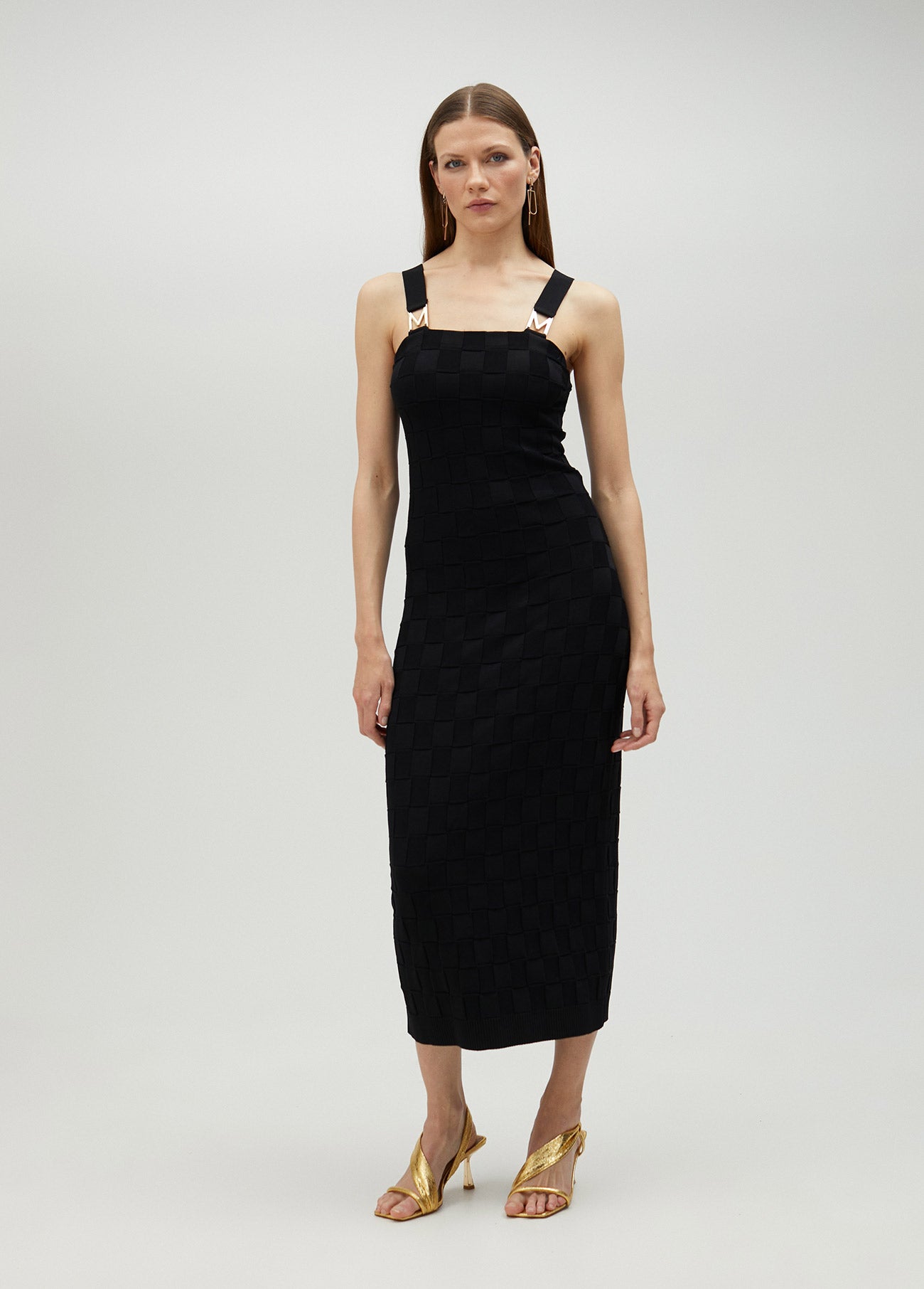 Knit dress with M detail on the strap