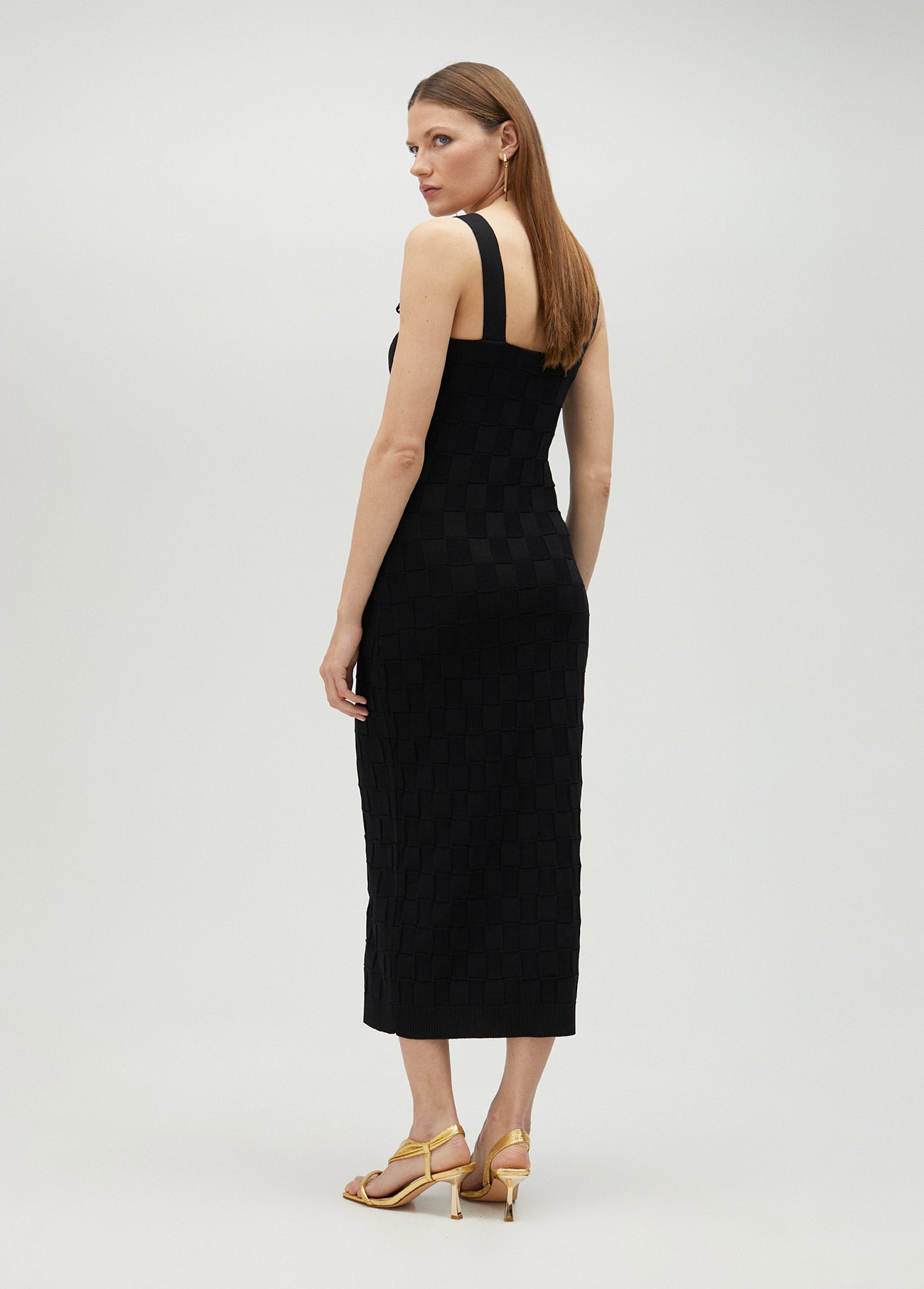 Knit dress with M detail on the strap