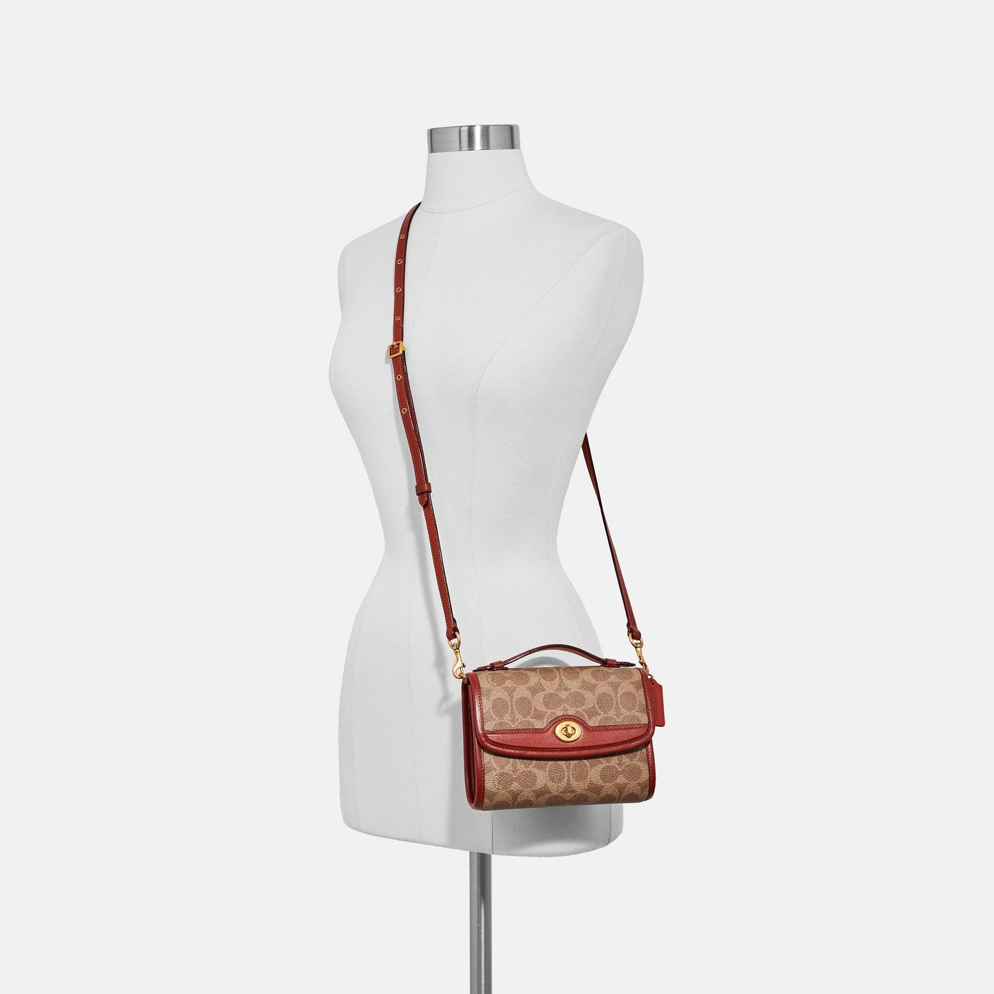 Kip Turnlock Crossbody In Signature Canvas - COACH Saudi Arabia Official Site