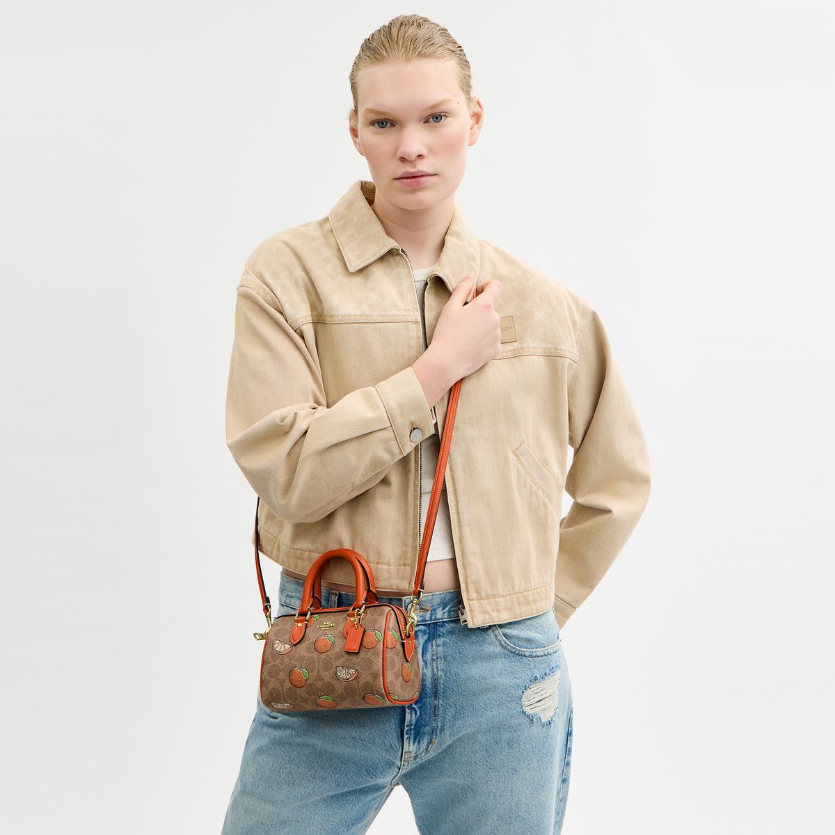 CAL18-Mini Rowan Crossbody Bag In Signature Canvas With Orange Print-Im/Tan Multi
