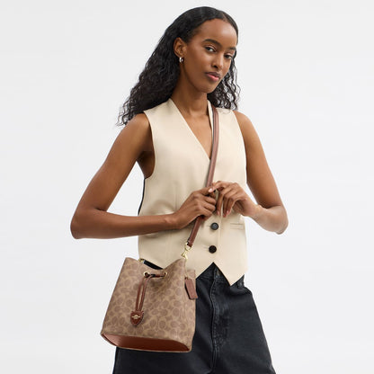 CBH07-Rowan Bucket Bag In Signature Canvas-Im/Tan/Brown